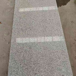 宝鸡芝麻白光面毛板